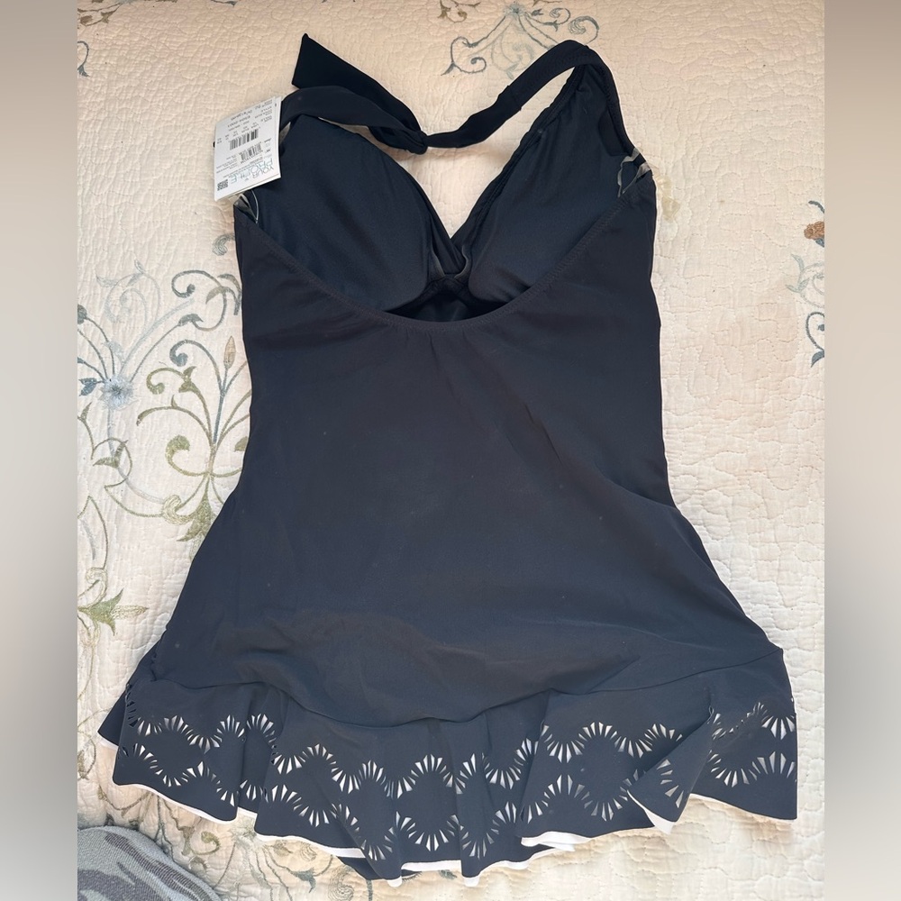 One piece women’s swim suit, with tags! Size 10 women’s.